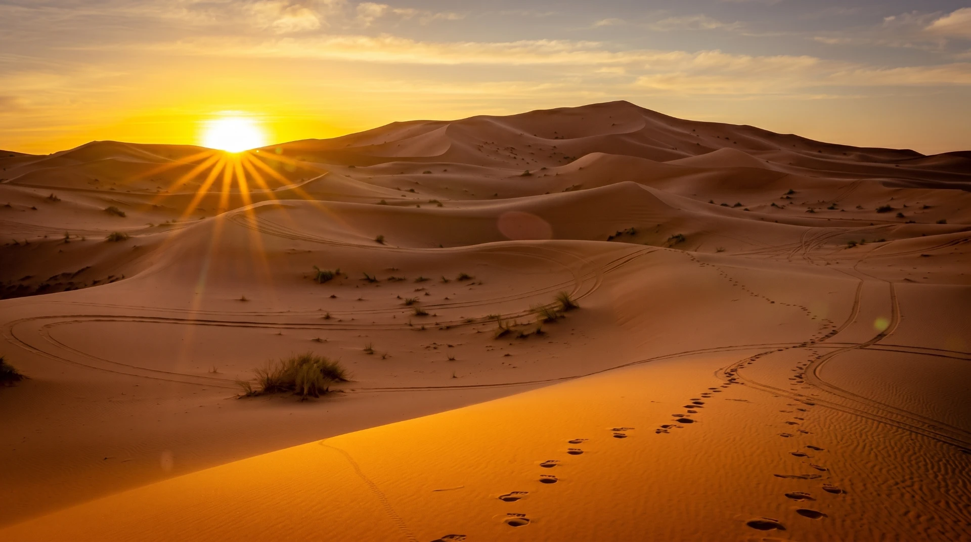 Sunrise over the Sahara dunes near M'Hamid El Ghizlane at the end of the journey