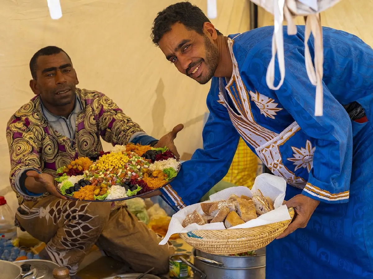Traditional Moroccan meal prepared during Sahara trekking
